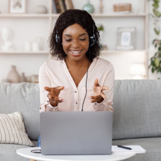 Client receiving coaching via online video meeting